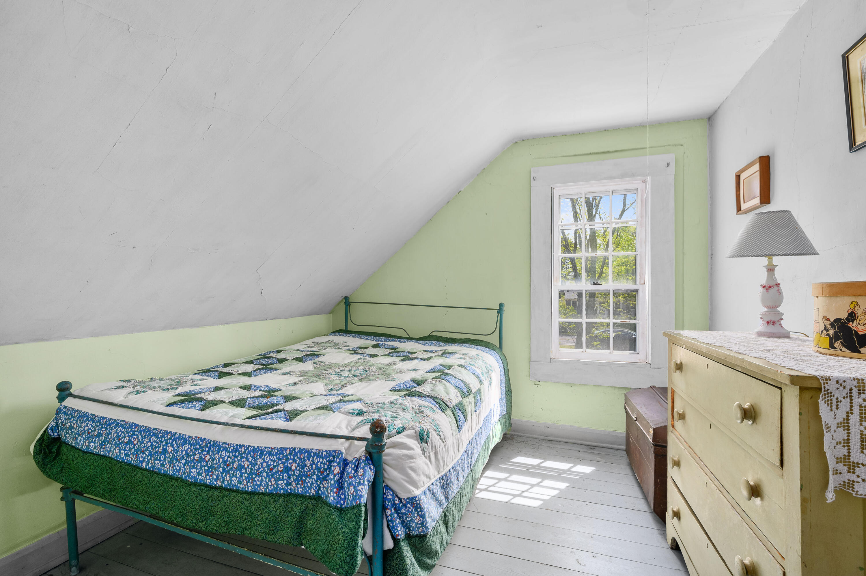 75 Massasoit Road Eastham, MA 02642 - Photo 30 of 49 a bedroom with a bed and a window