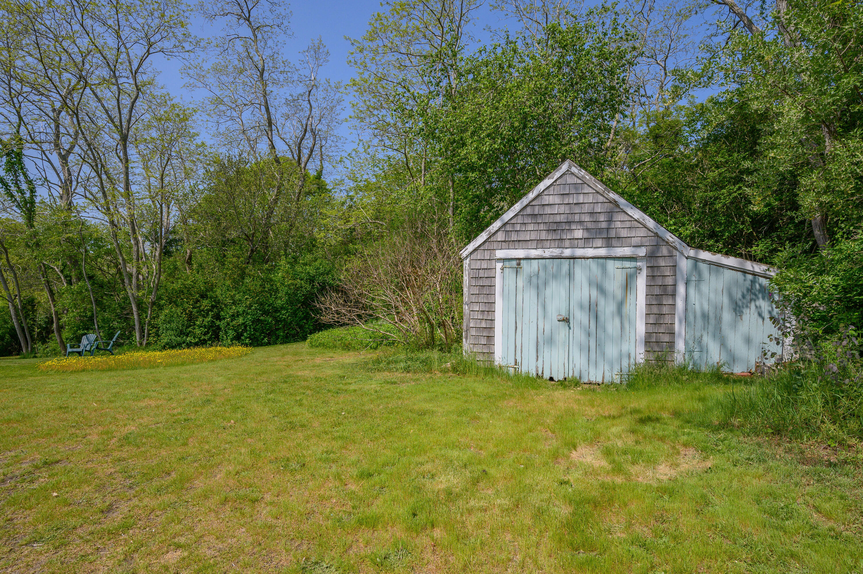 75 Massasoit Road Eastham, MA 02642 - Photo 3 of 49 a house with a yard