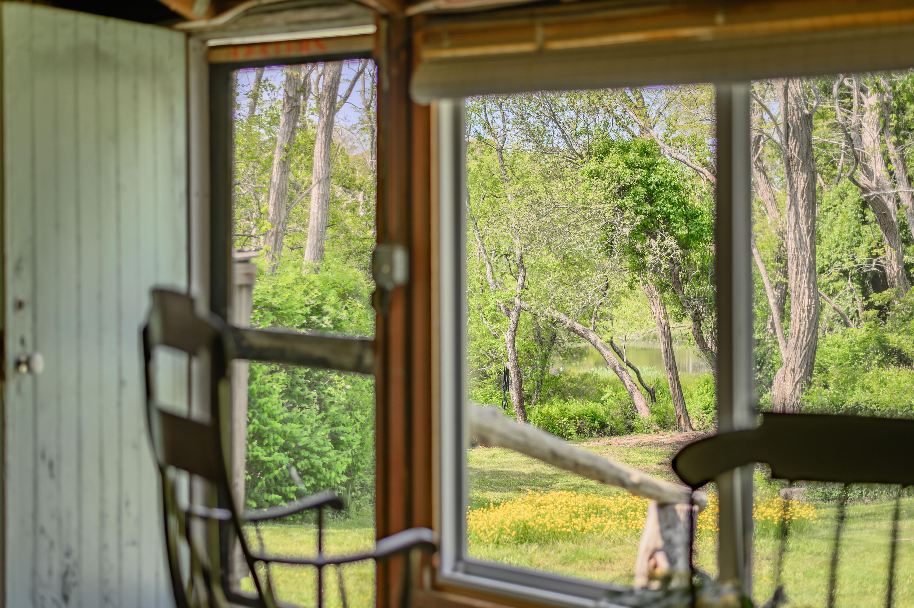 75 Massasoit Road Eastham, MA 02642 - Photo 6 of 49 a view of a porch and a yard