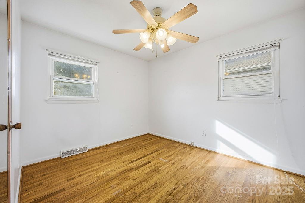 50 Huffman Road Asheville, NC 28806 - Photo 11 of 19 a view of empty room with wooden floor