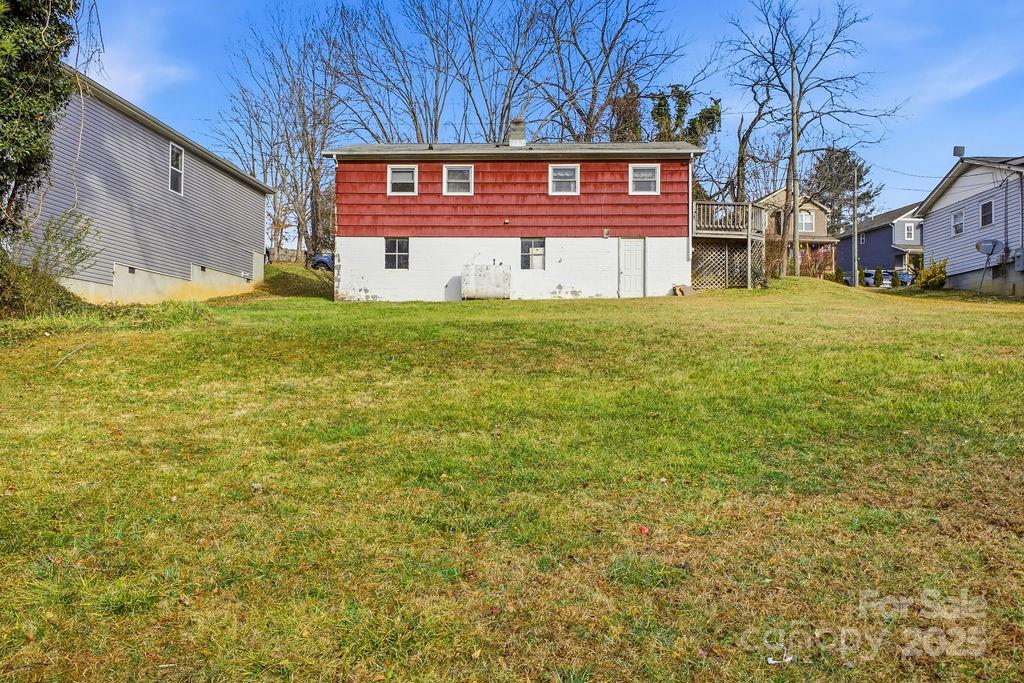 50 Huffman Road Asheville, NC 28806 - Photo 19 of 19 a view of a house with a yard