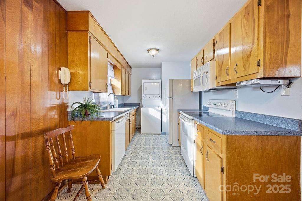 50 Huffman Road Asheville, NC 28806 - Photo 6 of 19 a kitchen with stainless steel appliances granite countertop a sink and a cabinets