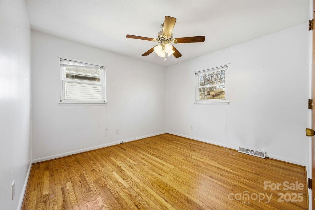 50 Huffman Road Asheville, NC 28806 - Photo 10 of 19 a view of an empty room with a window