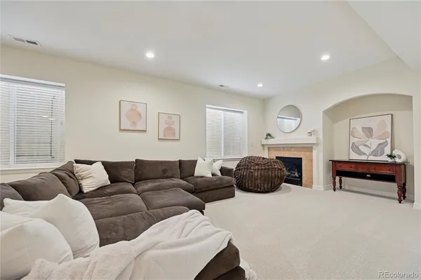 a living room with furniture and a couch