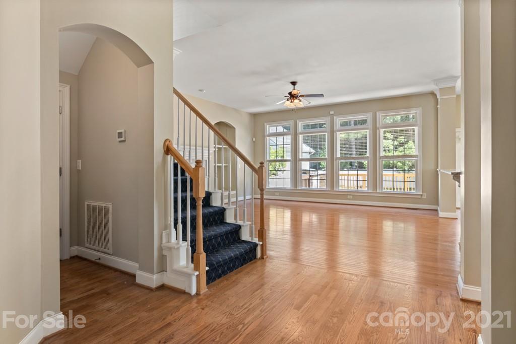 3272 Richard's Crossing, Unit 247 Fort Mill, SC 29708 - Photo 11 of 38 a view of an entryway with wooden floor and door
