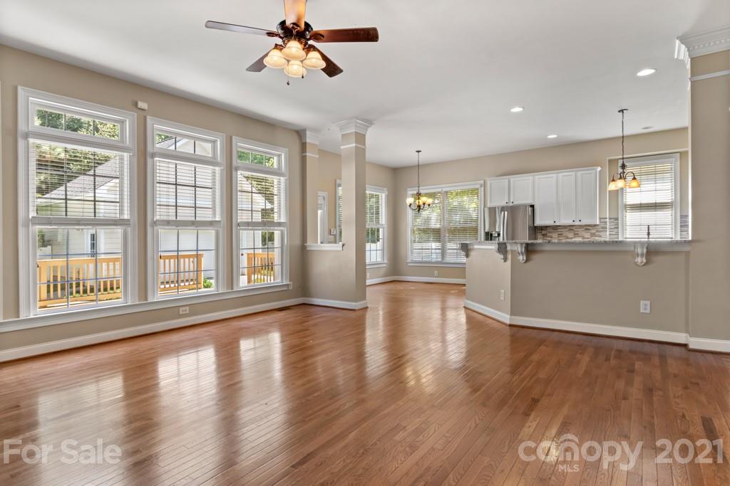 3272 Richard's Crossing, Unit 247 Fort Mill, SC 29708 - Photo 13 of 38 a view of a kitchen with a dishwasher cabinets and wooden floor
