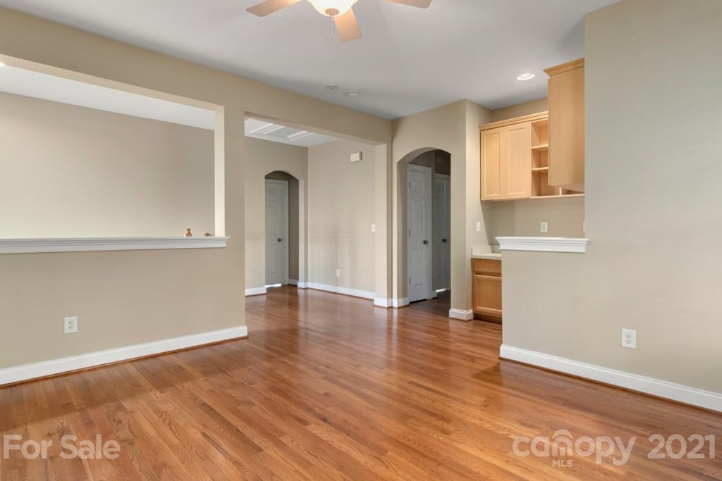 3272 Richard's Crossing, Unit 247 Fort Mill, SC 29708 - Photo 20 of 38 wooden floor in an empty room with a window