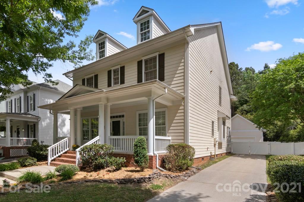 3272 Richard's Crossing, Unit 247 Fort Mill, SC 29708 - Photo 3 of 38 a view of a white house next to a yard