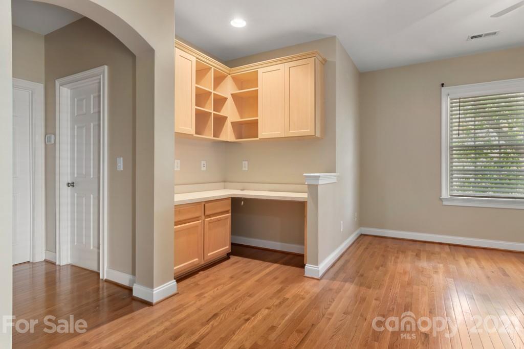 3272 Richard's Crossing, Unit 247 Fort Mill, SC 29708 - Photo 21 of 38 a view of a kitchen with wooden floor and electronic appliances