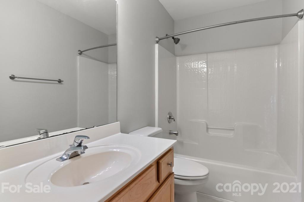 3272 Richard's Crossing, Unit 247 Fort Mill, SC 29708 - Photo 25 of 38 a bathroom with a sink toilet and shower
