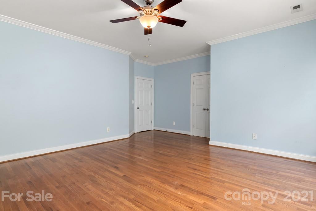 3272 Richard's Crossing, Unit 247 Fort Mill, SC 29708 - Photo 29 of 38 a view of an empty room with wooden floor