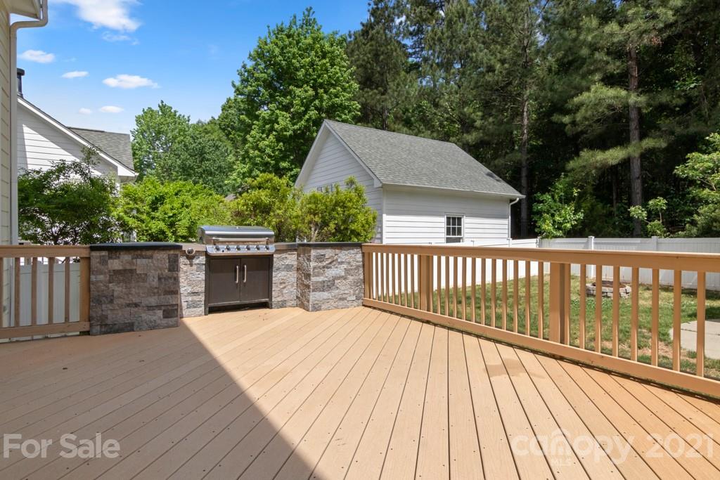 3272 Richard's Crossing, Unit 247 Fort Mill, SC 29708 - Photo 35 of 38 a balcony with wooden floor and fence