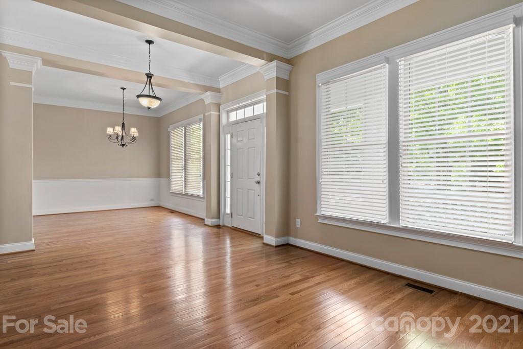 3272 Richard's Crossing, Unit 247 Fort Mill, SC 29708 - Photo 10 of 38 a view of a livingroom with wooden floor and a window