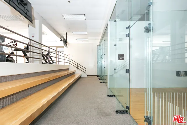 a bathroom with a tub and shower