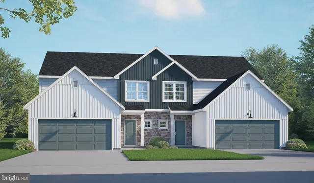 a view of a yard in front view of a house