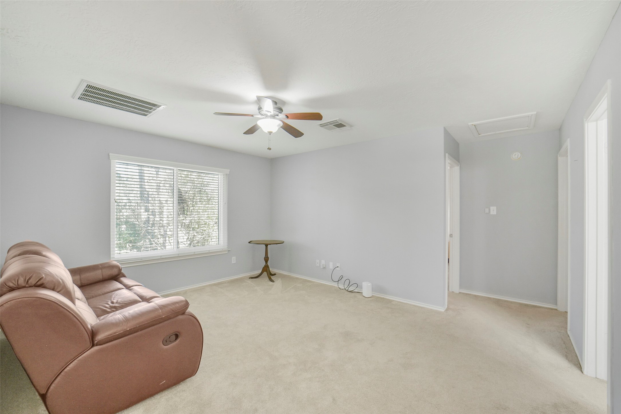 38 Tallow Hill Place Spring, TX 77382 - Photo 27 of 50 a living room with furniture and a window