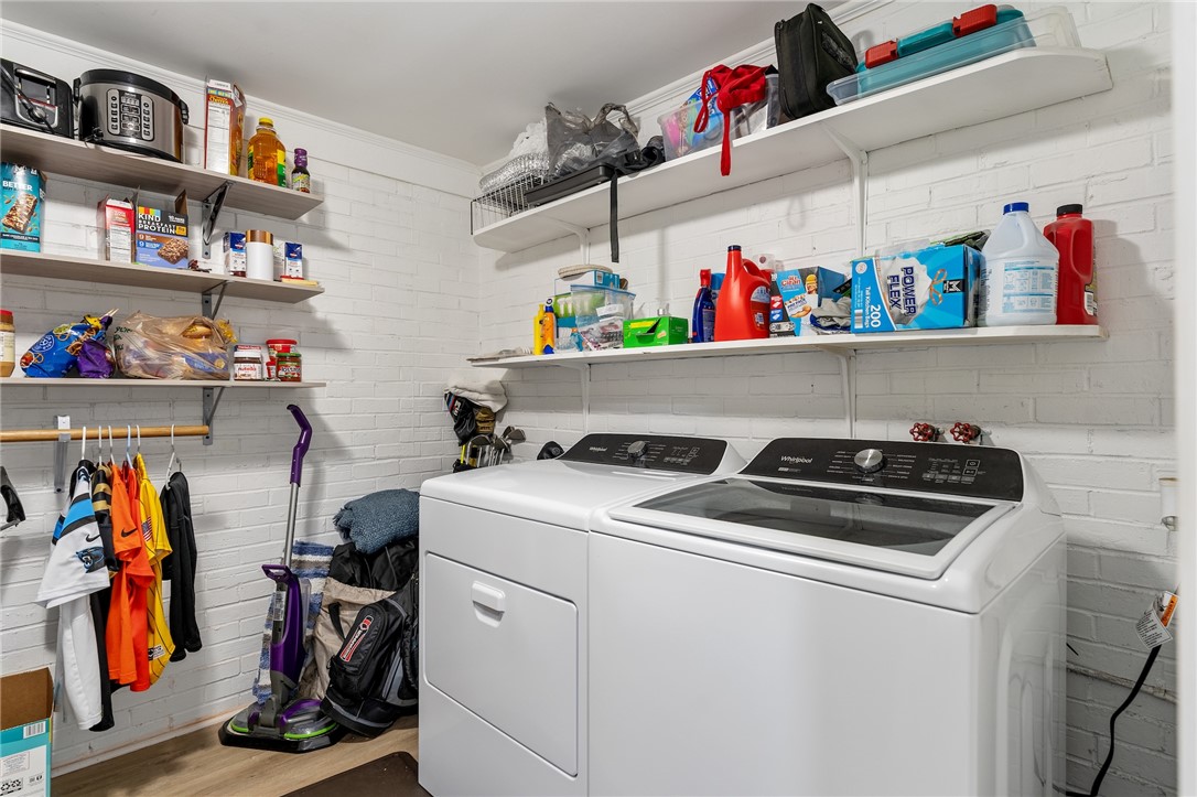 1007 Brown Road Anderson, SC 29621 - Photo 14 of 27 Functional laundry space with convenient shelving for all your household needs.