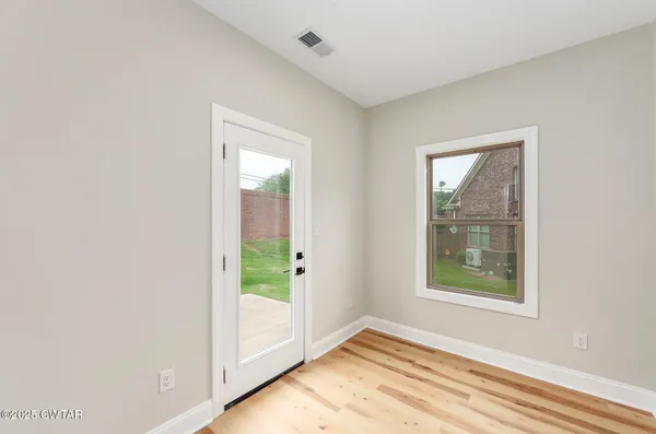 an empty room with windows