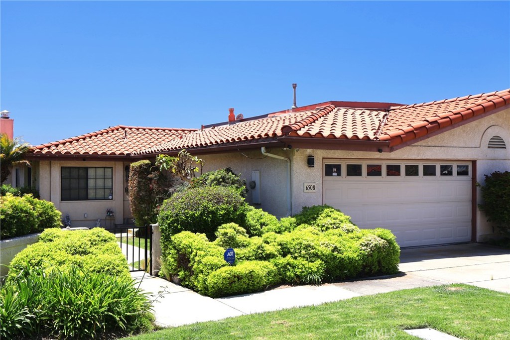 6508 Sandy Point Court Rancho Palos Verdes, CA 90275 - Photo 3 of 66 a front view of a house with a yard