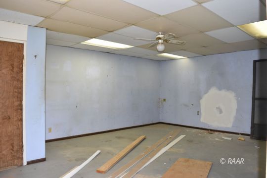 1345 Dunes Street Ridgecrest, CA 93555 - Photo 27 of 31 a view of a room with a ceiling fan and carpet