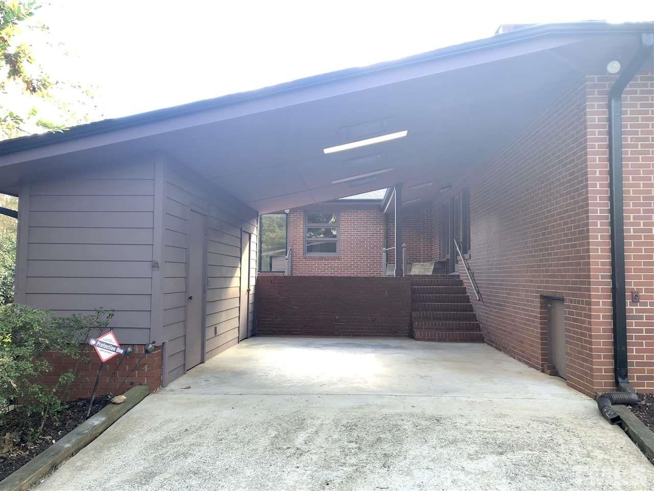 521 Buck Jones Road Raleigh, NC 27606 - Photo 22 of 30 a front view of a house