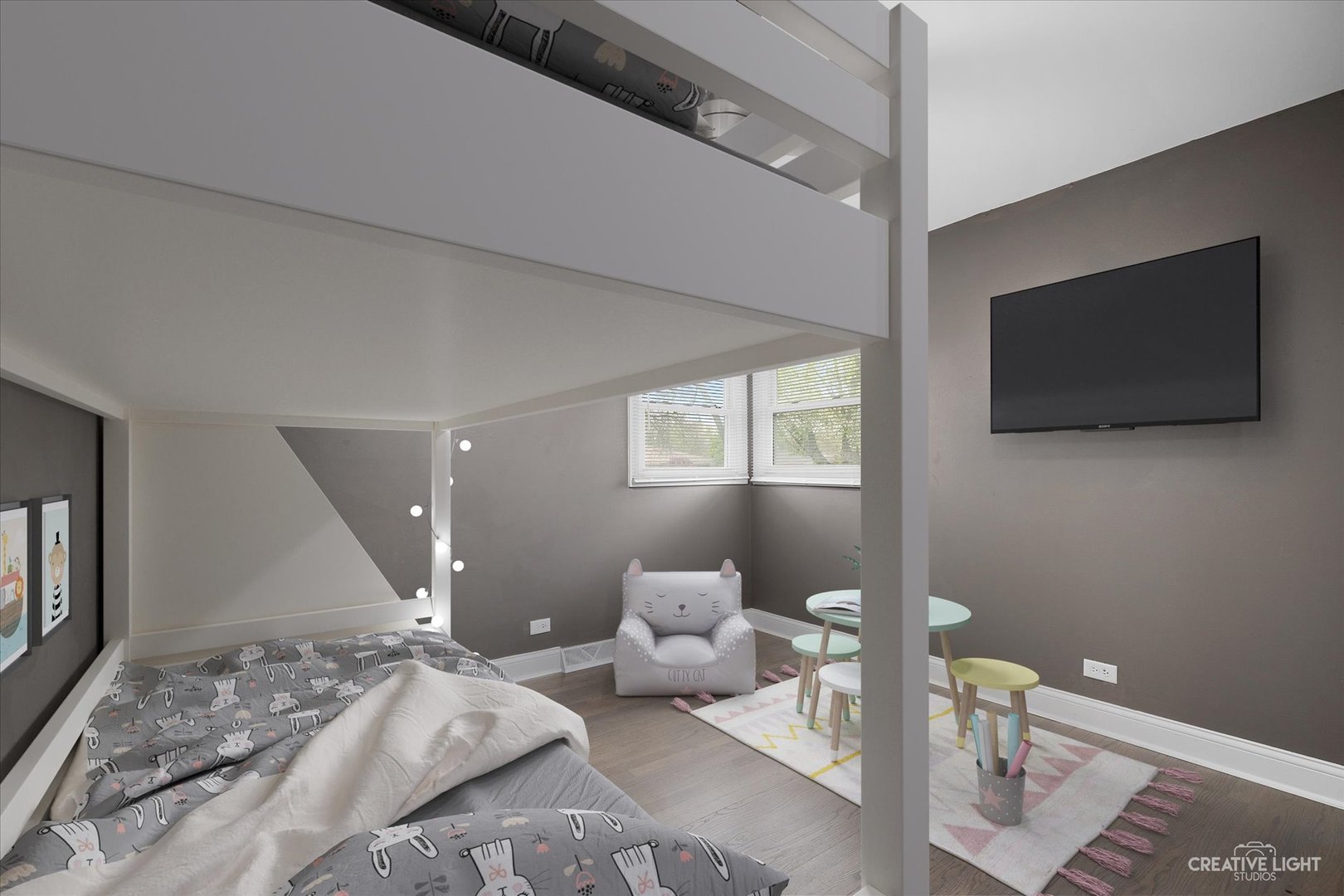 650 West Ronald Drive Addison, IL 60101 - Photo 11 of 14 a bedroom with a bed and a flat screen tv