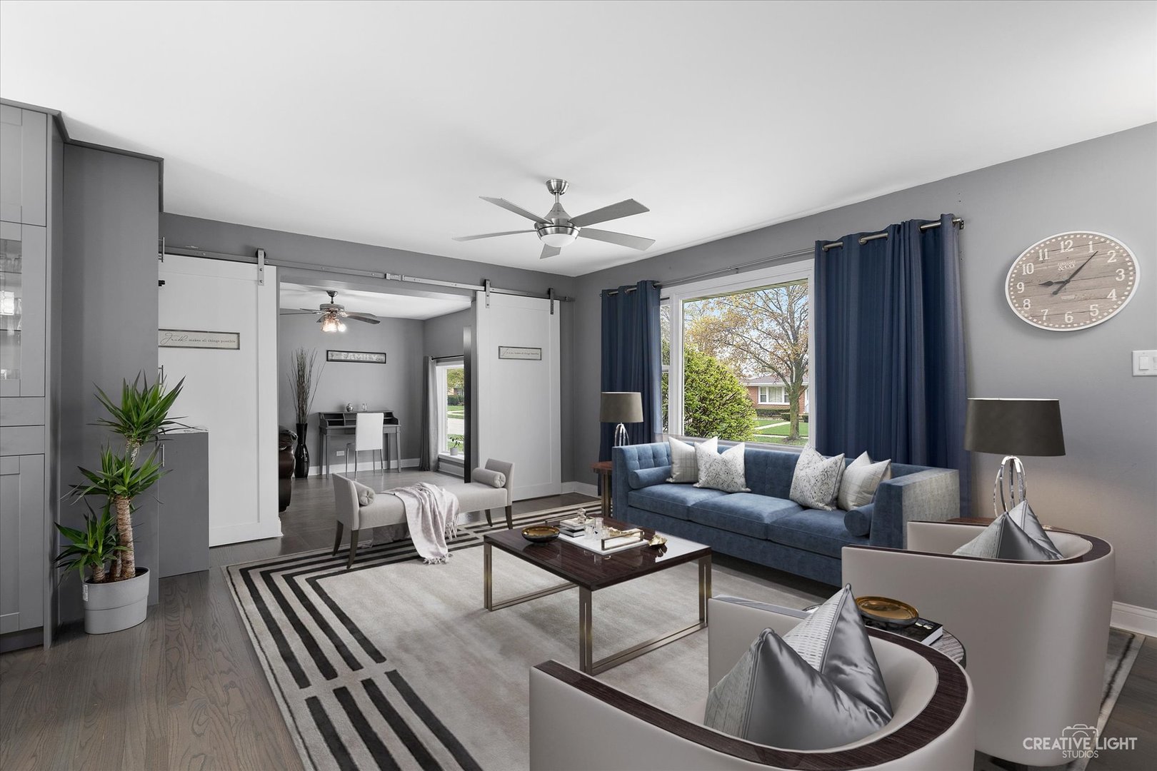 650 West Ronald Drive Addison, IL 60101 - Photo 2 of 14 a living room with furniture and a large window