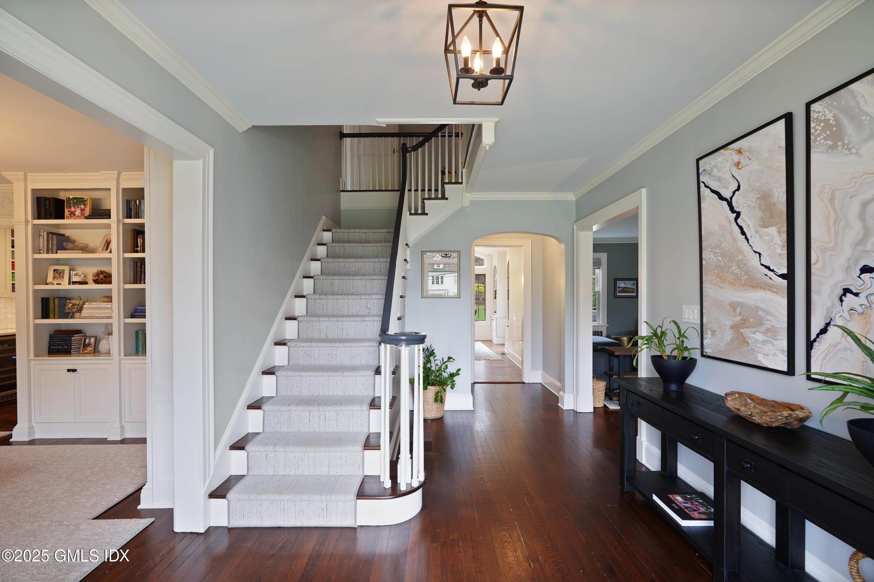 15 Anderson Road Greenwich, CT 06830 - Photo 2 of 7 a view of a hallway with wooden floor and entryway