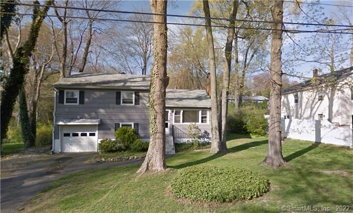 95 Indian River Road Milford, CT 06460 - Photo 1 of 1 a view of a house with a yard