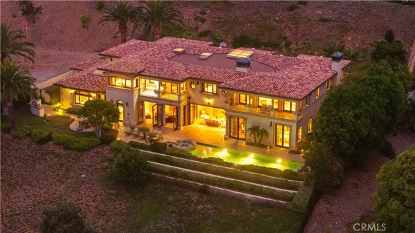 a view of multiple houses with a yard