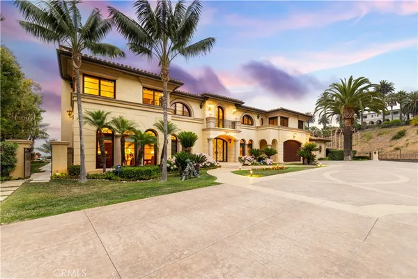 a view of swimming pool with outdoor seating and city view