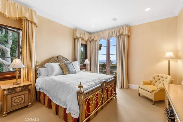 a view of a hallway with entryway wooden floor and front door