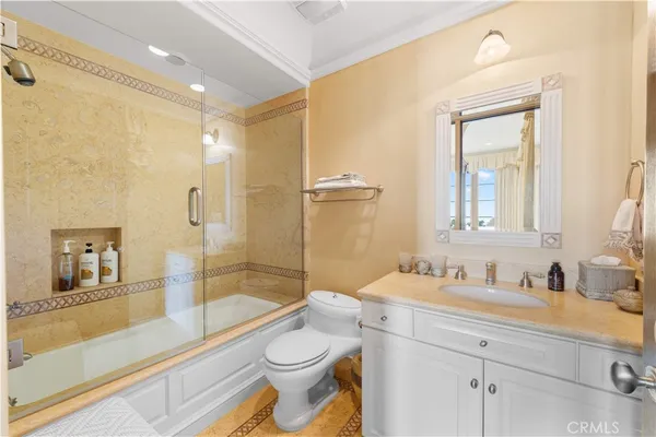 a lobby with furniture and a large window