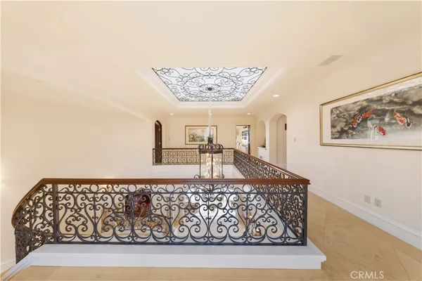 a view of a hallway with living room