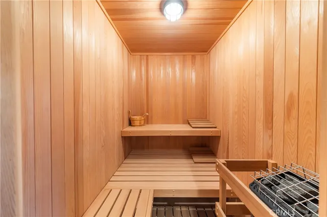 a spacious bathroom with a granite countertop tub sink and mirror