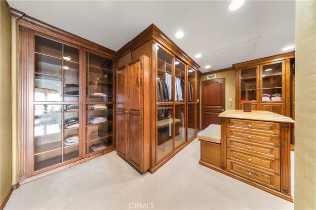 a view of a workspace with furniture and lounge chair