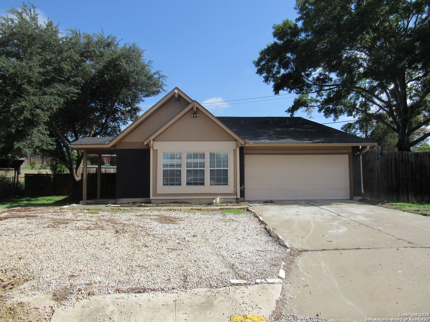 7731 Clear Ridge Drive San Antonio, TX 78239 - Photo 1 of 54 a front view of a house with a yard