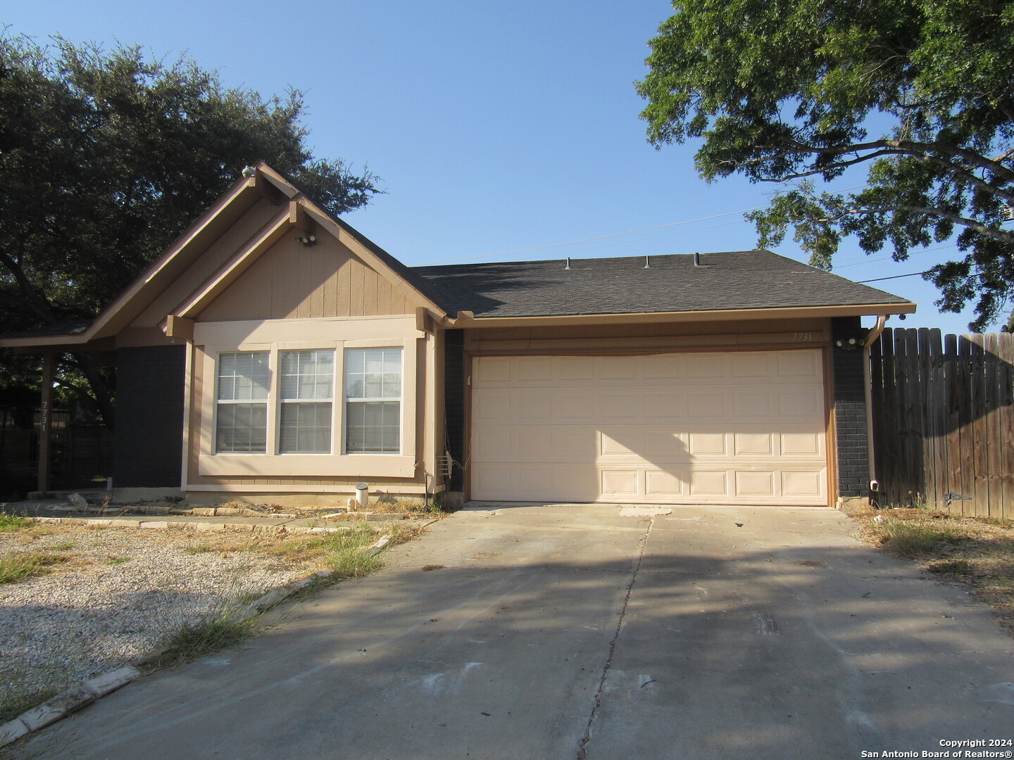 7731 Clear Ridge Drive San Antonio, TX 78239 - Photo 43 of 54 a front view of a house with a yard