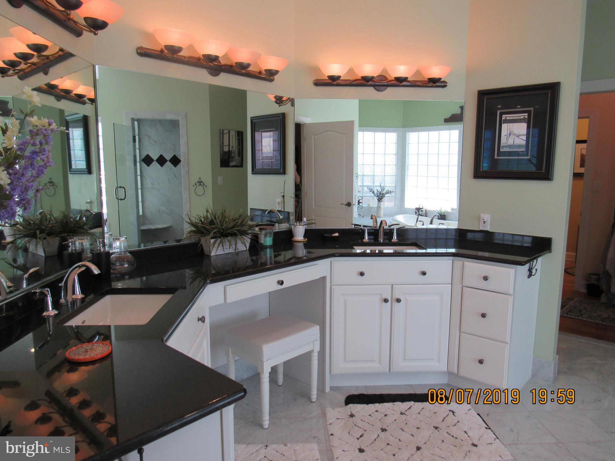 4840 Bayside Road Chesapeake Beach, MD 20732 - Photo 27 of 69 Lots of cabinetry space in master bath