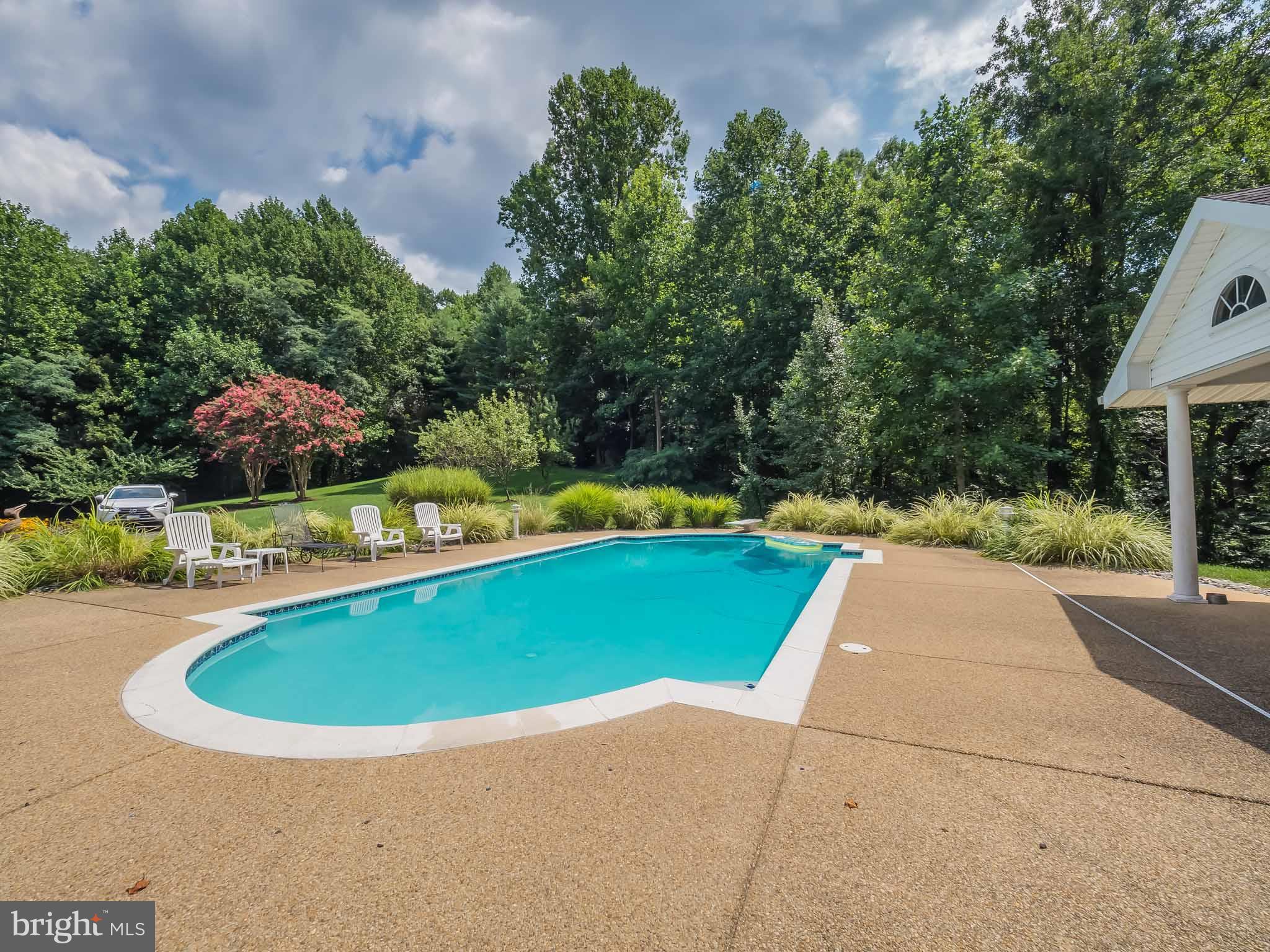 4840 Bayside Road Chesapeake Beach, MD 20732 - Photo 57 of 69 Beautiful pool with concrete surround