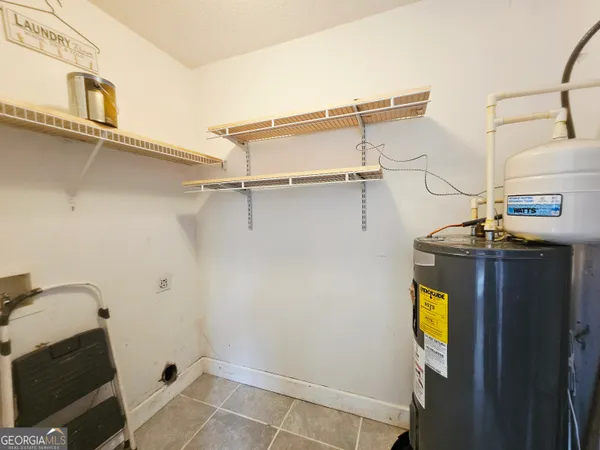 a view of storage and utility room