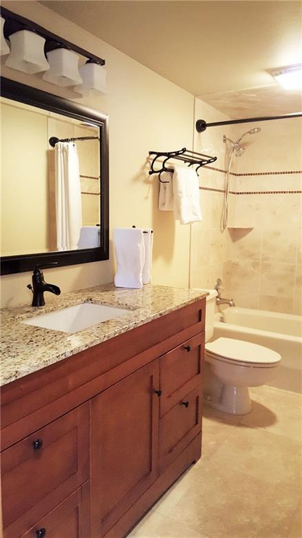 875 4 O Clock Road, Unit D1 Breckenridge, CO 80424 - Photo 12 of 25 a bathroom with a granite countertop sink and a mirror