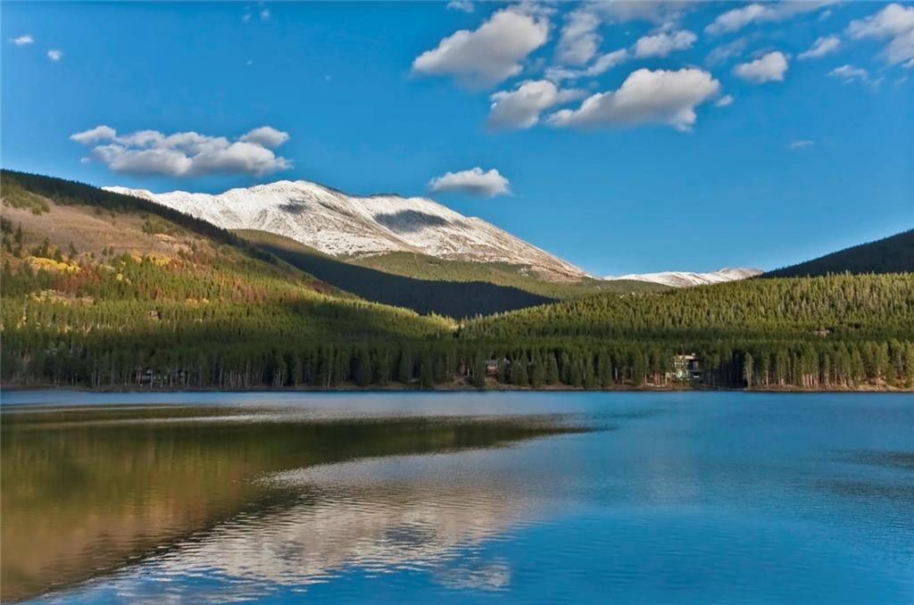 875 4 O Clock Road, Unit D1 Breckenridge, CO 80424 - Photo 22 of 25 a view of a swimming pool with an outdoor space and seating area