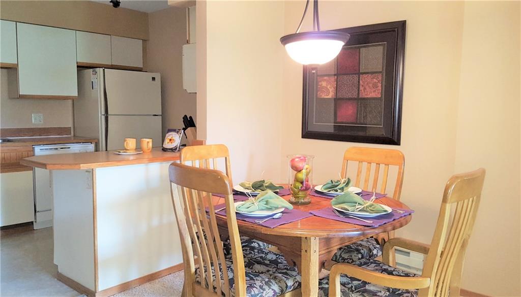 875 4 O Clock Road, Unit D1 Breckenridge, CO 80424 - Photo 9 of 25 a view of a dining room with furniture