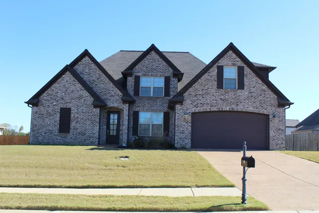 a house view with a garden space