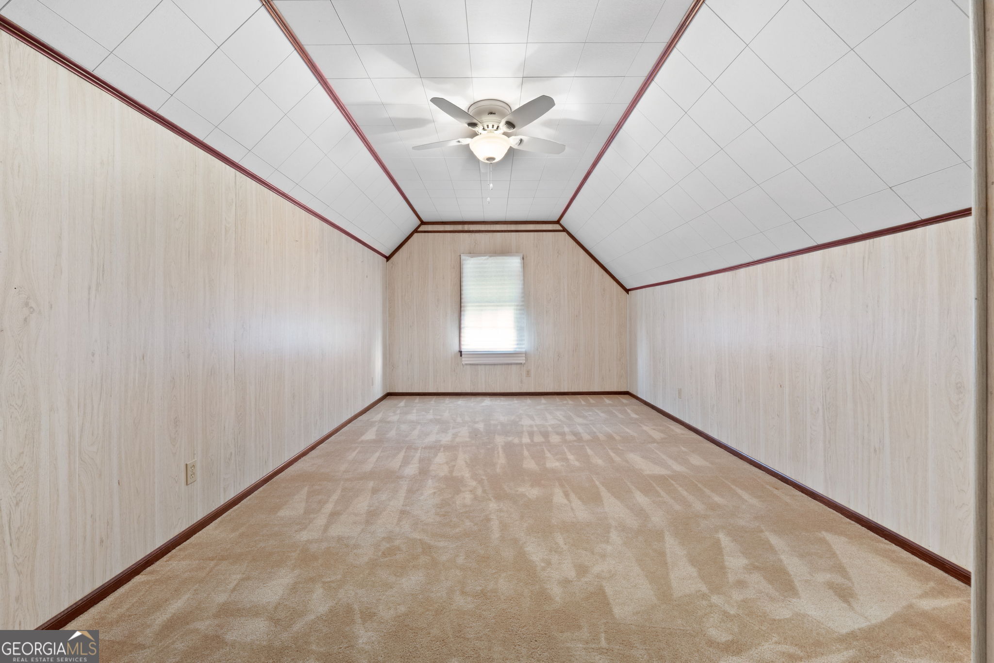 2050 North McDonough Road Griffin, GA 30223 - Photo 22 of 42 a view of an empty room with a window