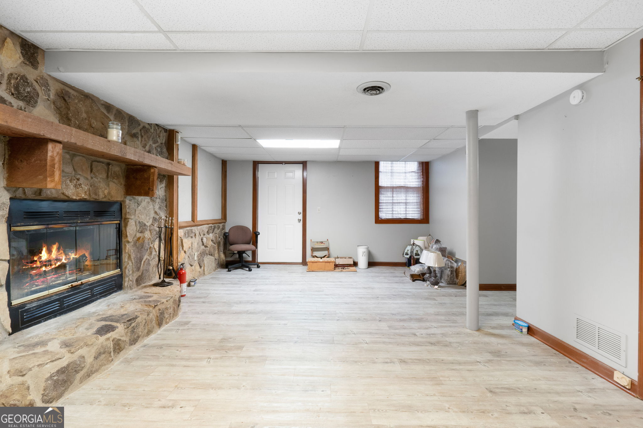 2050 North McDonough Road Griffin, GA 30223 - Photo 27 of 42 a view of a livingroom with furniture and a fireplace