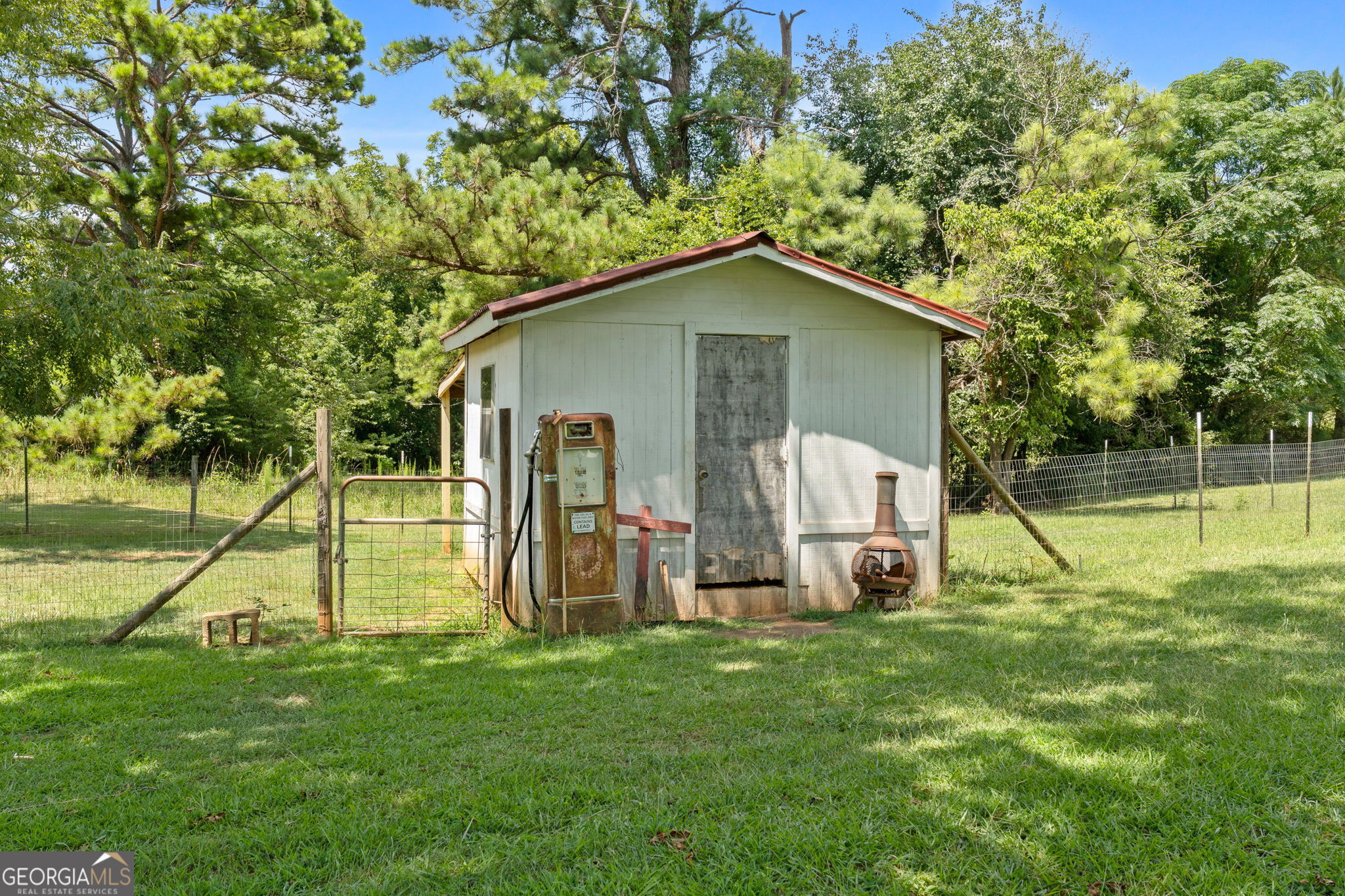 2050 North McDonough Road Griffin, GA 30223 - Photo 35 of 42 a view of backyard with a garden and entertaining space