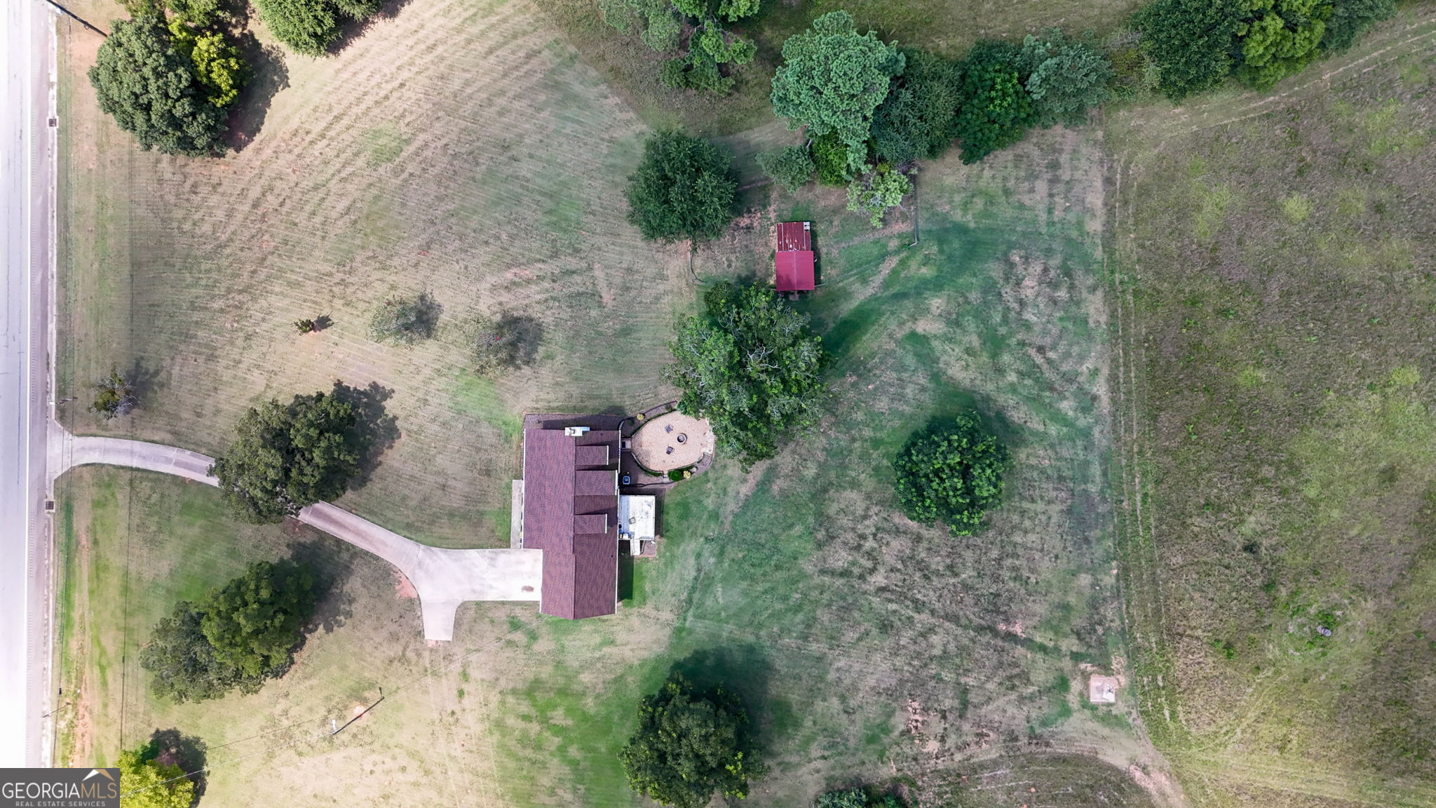 2050 North McDonough Road Griffin, GA 30223 - Photo 40 of 42 a view of a flower arrangement in backyard