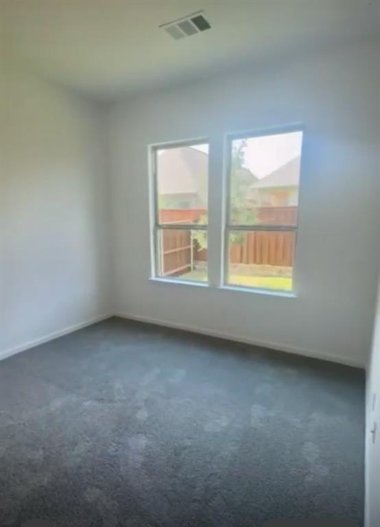 3121 Winecup Way Little Elm, TX 75068 - Photo 15 of 23 an empty room with a window